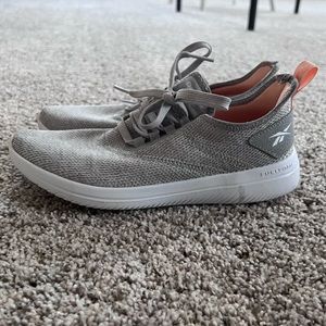 Gray Reebok sneakers